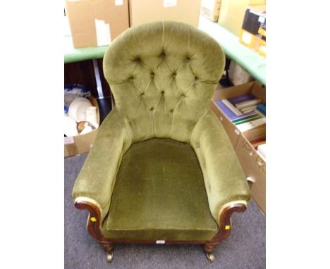 An early Victorian button upholstered spoon back salon armchair