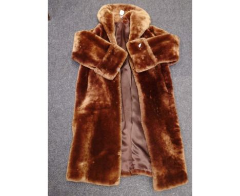 A mid 20th century lady’s full length fur coat