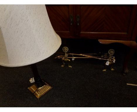 A collection of mostly brass items, including fire irons, dogs and lamp, etc