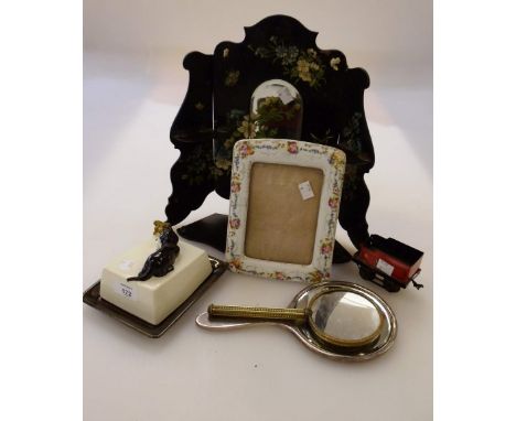 A butter dish, a paper maché mirrored folding shelf, a silver hand mirror and other items