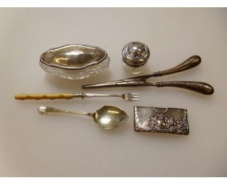 A collection of small silver items, including card sleeve, rouge pot, button hook, glove stretchers, etc