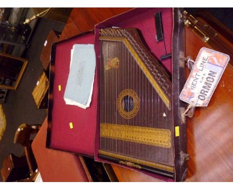 An early American mandolin guitar, cased