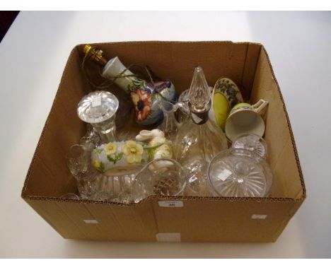 A mixed quantity of glassware, including decanters together with a Moorcroft lamp and other items.