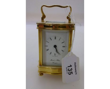 A miniature gilt brass serpentine five glass carriage timepiece, the enamel dial named Morrell and Hilton, Huntingdon