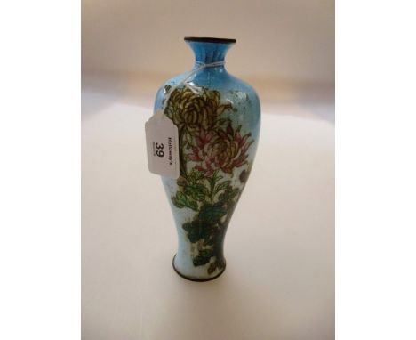 A Japanese Taisho period Ginbari cloisonne Meiping vase, decorated with chrysanthemums on a light blue ground, 19cm high