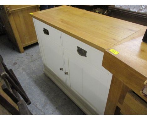 A modern off white painted kitchen cabinet with an oak top with two short drawers, on bracket feet 33 1/2"h x 18 3/4"w x 42"l