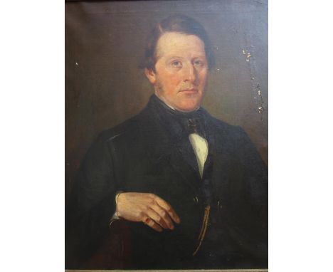 English School - a 19th century portrait of a gentleman with a gold and ruby ring on his right hand, oil on canvas, unsigned 