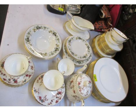 A Minton Golden Heritage part dinner service having a white ground with gold coloured rim, together with a Royal Doulton Larc