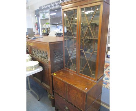 Edwardian inlaid mahogany bookcase/side cabinet with twin astrigal glazed doors, twin cupboards above a drawer on bracket fee