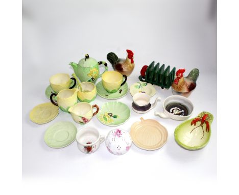A mixed group of mainly Australian stamp Carltonware to include cups, jugs, teapot, pomander, cockerel ramekins, toast rack e