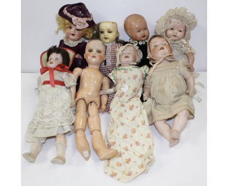 Eight porcelain and bisque head dolls to include examples by Simon Halberg, Armand Marseille and Heinrich Handwerck, height o