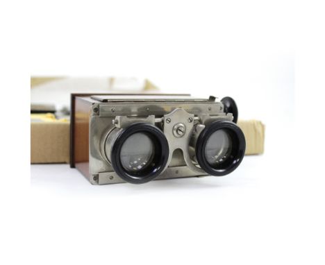 A French mahogany glass slide stereo viewer, the label with 'Stereoscope Breveté S G D G Vues Prises Avec le Verascope Richar