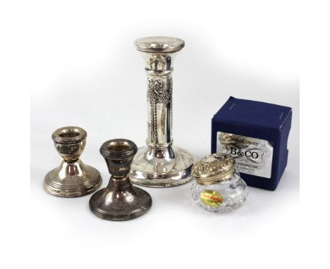 A silver candlestick in the Art Nouveau style, marked '925', height 16cm, two non-matching hallmarked silver dwarf candlestic