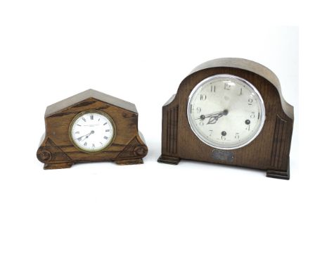 An Enfield Royal oak-cased mantel clock with three-train movement, chiming and striking on rods, with presentation plaque 'To