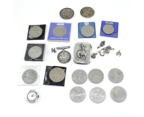 Eleven commemorative coins, some mint, to include Elizabeth II 1977, Charles and Diana, Churchill etc, two medals for the 'Bi