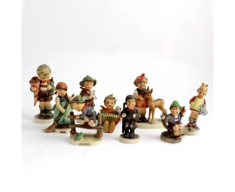 A collection of Hummel figures to include a girl petting a deer 'Friends', a boy holding a lamb 'The Lost Sheep' and a 'Chimn