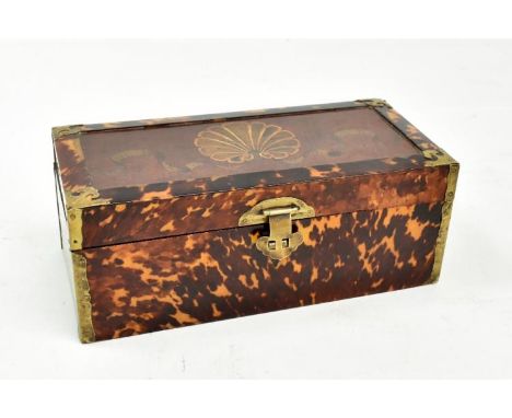 A late 19th/early 20th century Chinese tortoiseshell mounted rectangular box with gilt metal mounts and ruyi-shaped clasp, wi