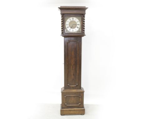 An early/mid-20th century oak brass-faced longcase clock with three-train movement striking and chiming on rods, height appro