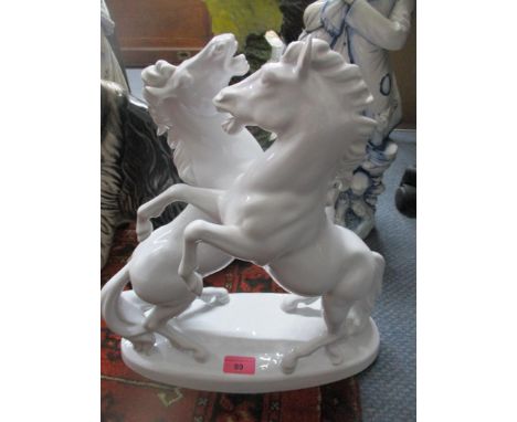 A miscellaneous lot to include a selection of ceramic figurines and animals models and others to include a Keramos Viennese a