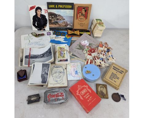 A mixed lot to include cigarette cards, playing cards, Looe & Polperro holiday items, photographs, a miniature gilt photo fra