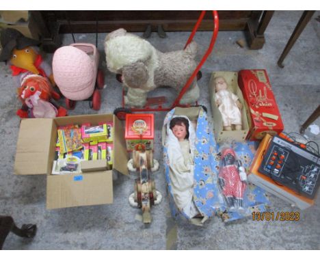 A collection of 1950s and later vintage toys to include a soft toy pull-along toy dog on tin plate frame, boxed Pedigree doll