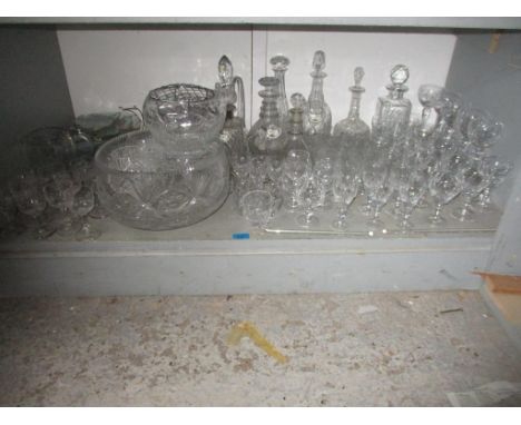 A selection of cut crystal table glass to include Brierley drinking glasses, a late Georgian decanter and stopper, and a Vict