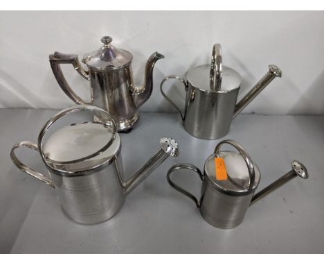 Three Kenneth Turner silver plated jugs in the former cans together with a small teapot retailed by Bergdorf GoodmanLocation: