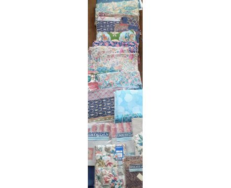 Late 20th Century fabric remnants to include 2 metres of Chateau chintz from the Sheridan Range in blue and cream with fleur 