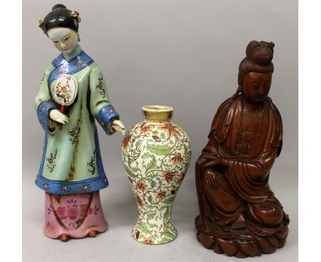 A GOOD QUALITY CHINESE CARVED WOOD FIGURE OF GUANYIN, seated in flowing robes and bearing a scroll, 12.3in high; together wit