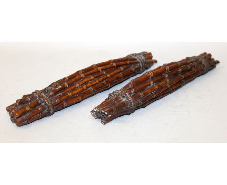AN UNUSUAL PAIR OF CHINESE WOOD SCROLL WEIGHTS, each in the form of a stack of rope bound bamboo, each 11.4in wide.