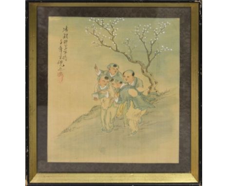 A FRAMED EARLY 20TH CENTURY CHINESE PAINTING ON SILK, painted with calligraphy and with a group of boys conversing beneath a 