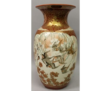 A JAPANESE KUTANI PORCELAIN VASE, circa 1900, one side painted with a panel of birds in flight above blossoms, the reverse wi