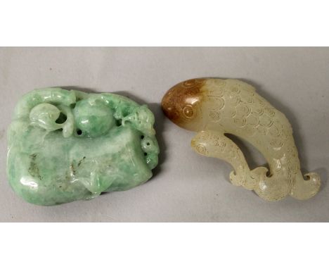A CHINESE APPLE-GREEN JADE PENDANT, in the form of a monkey clambering up the side of a gourd, 2.2in high; together with a wh