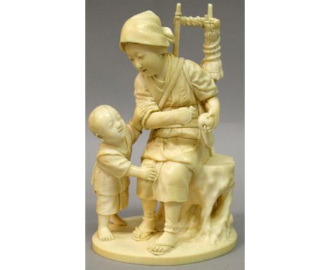 A FINE QUALITY SIGNED JAPANESE MEIJI PERIOD IVORY OKIMONO, of a woman seated on a tree trunk in the company of her son, her k