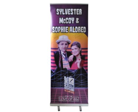 Sylvester McCoy and Sophie Aldred&nbsp; - Doctor Who - autographed Monopoly Events banner from the ' For The Love Of 80's ' e