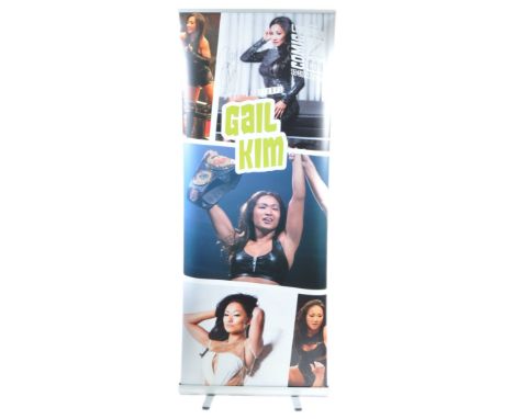 Gail Kim -&nbsp;WWE Wrestling / Wrestler - autographed Monopoly Events banner from a ' Liverpool Comic Con ' event. The banne
