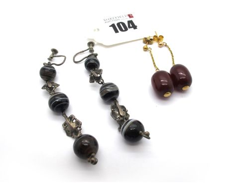 A Pair of Antique Banded Agate Bead Drop Earrings, on unpierced screw fittings; A Pair of Cherry Amber Coloured Bead Drop Ear
