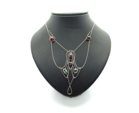 An Arts & Crafts Style Necklace, of openwork sinuous design, cushion and oval collet set, suspending teardrop (lacking centra