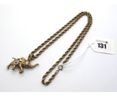 A Long 9ct Gold Ropetwist Chain, suspending a novelty 9ct gold articulated elephant pendant, with inset highlights.