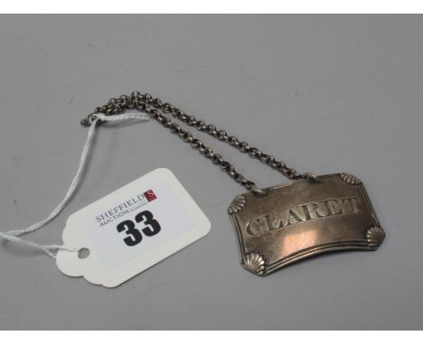 A Part Hallmarked Silver Decanter Label, James Barber & William Whitwell, York(?), 'Claret', with shell detail, on chain susp
