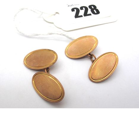 A Pair of 9ct Gold Cufflinks, the engine turned panels on chain connections (5grams).  