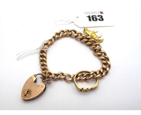 A Graduated Curb Link Bracelet, to a 9ct gold heart shape padlock style clasp (lacking safety chain), suspending a novelty bu