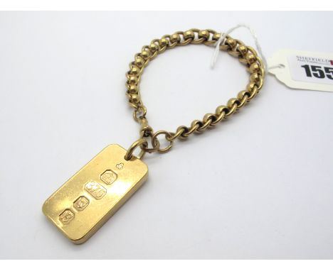 A 9ct Gold Rollerball Bracelet, to swivel style clasp, suspending a 9ct gold ingot pendant (London 1976) (overall weight 54.5