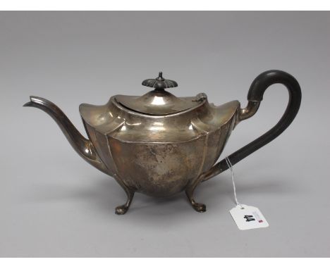 A Hallmarked Silver Teapot, CB&amp;S, Sheffield 1918, of shaped design raised on four pad feet, initialled (540grams). 