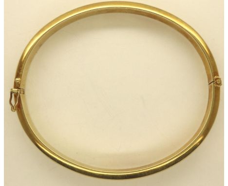 14ct gold snap bangle, 14.9g. P&amp;P Group 1 (£14+VAT for the first lot and £1+VAT for subsequent lots) 
