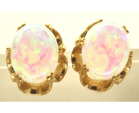 Pair of 9ct gold and opal earrings, combined 1.9g, L: 12 mm. P&amp;P Group 1 (£14+VAT for the first lot and £1+VAT for subseq