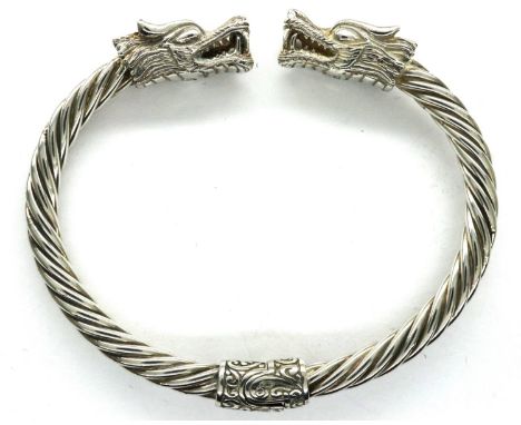 925 silver bangle with dragon head terminals, D: 70 mm, 30g. P&amp;P Group 1 (£14+VAT for the first lot and £1+VAT for subseq