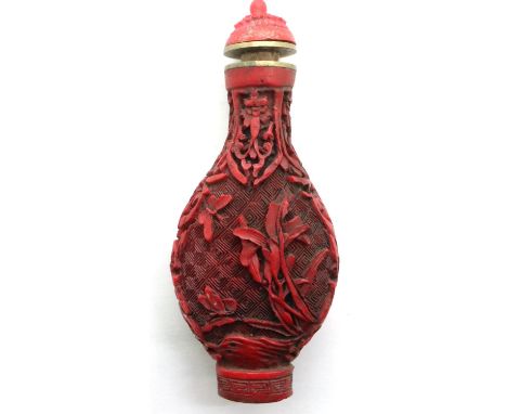 Carved Chinese cinnabar snuff bottle, H: 80 mm, no damages. P&amp;P Group 1 (£14+VAT for the first lot and £1+VAT for subsequ