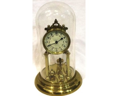 Enamel face brass anniversary clock in a glass dome, H: 32 cm, not working at lotting. Not available for in-house P&amp;P 
