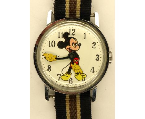 1970s Timex Mickey Mouse mechanical wristwatch on a canvas strap, working at lotting. P&amp;P Group 1 (£14+VAT for the first 